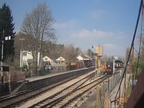 A heritage train beside the platform at Buckfastleigh station on the South Devon Railway, seen on the live webcam