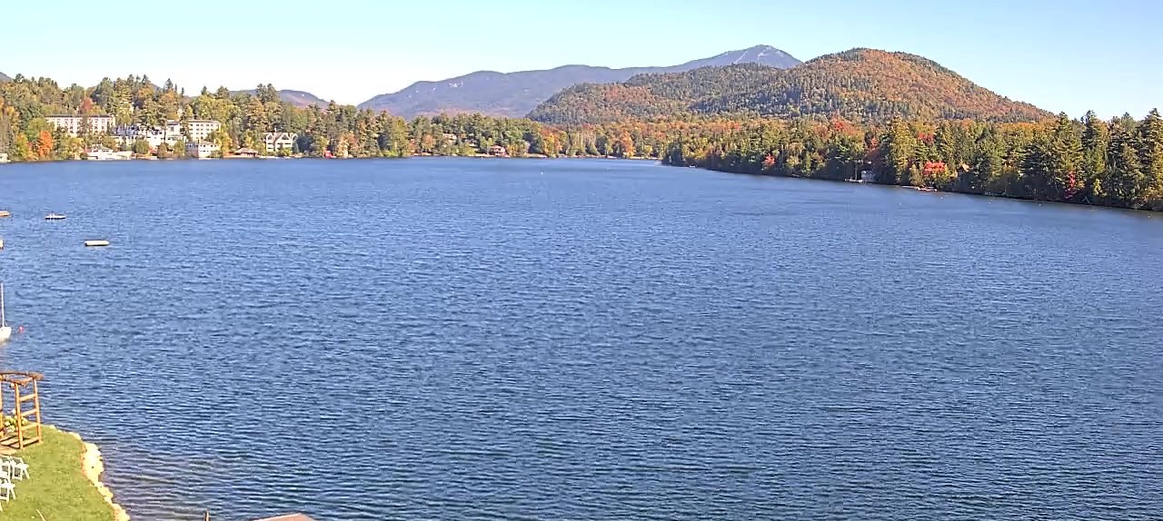 Mirror Lake in Lake Placid with early fall color on the Adirondack hills, live webcam