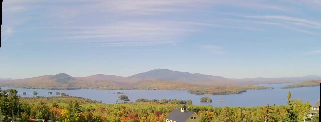 Moosehead Lake and its islands beyond turning red and orange trees in Maine, live webcam